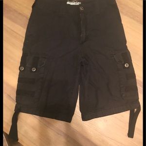 Black cargo shorts. Machine brand